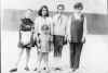 1 Мая 1972 года Мои подруги Таня Петракова, Лена Мазур, я, Лариса Снегирева и её сестренка около клуба.
